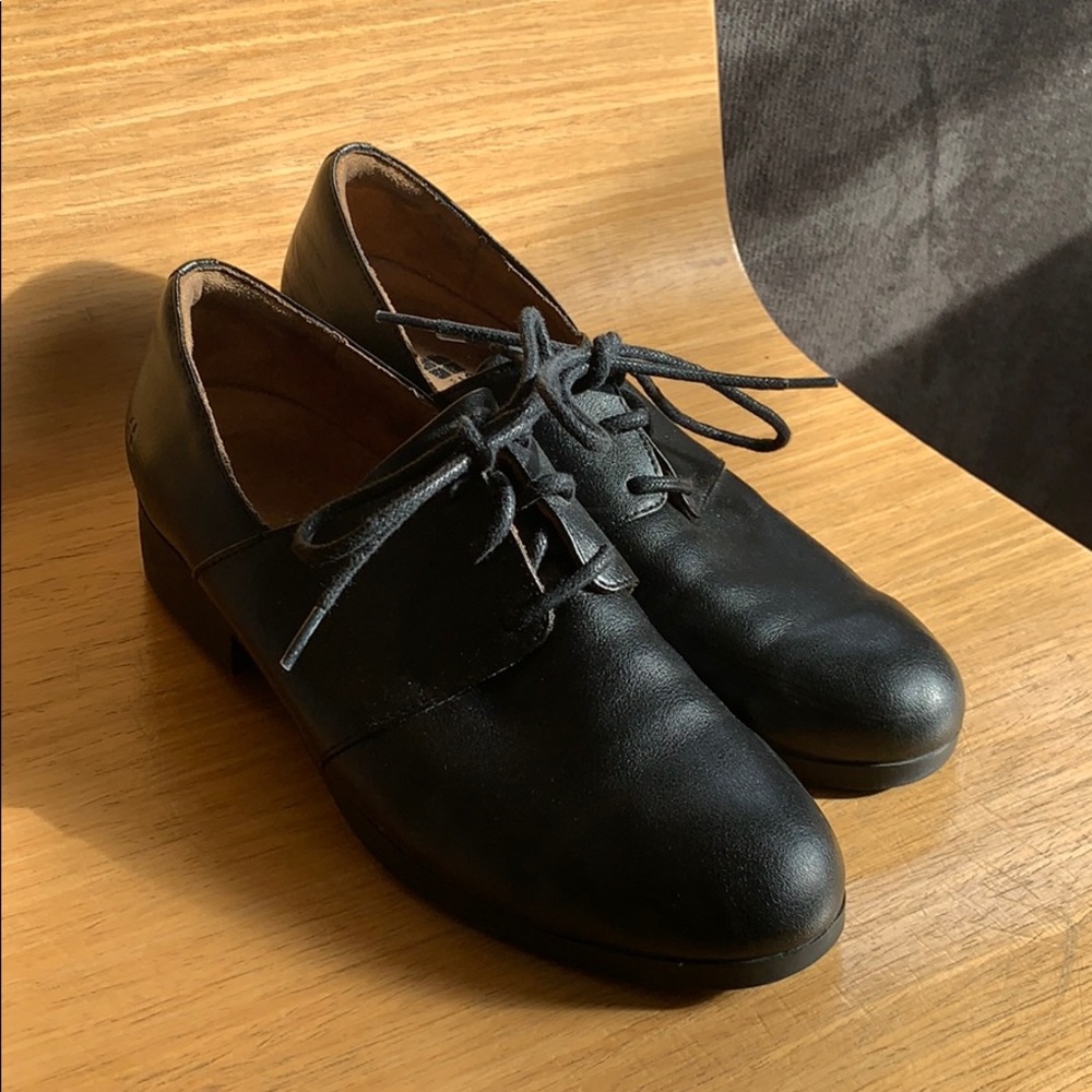 Black leather oxford slips